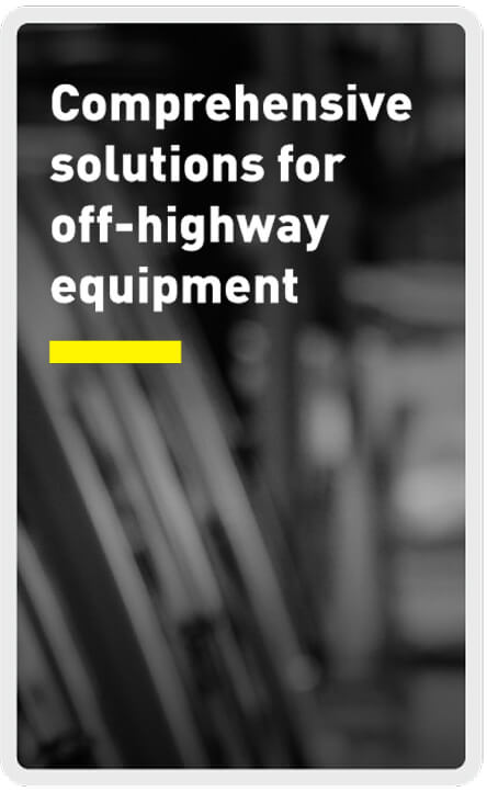 Text reads "Comprehensive solutions for off-highway equipment" in white letters over a blurred grayscale background with a yellow underline highlighting part of the text.